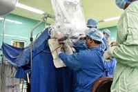 Performing a Microsurgery on a Rare Brain Tumor (fourth ventricle) on an Afghan Young Man